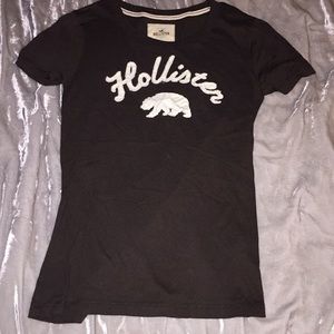 Brown Hollister shirt.